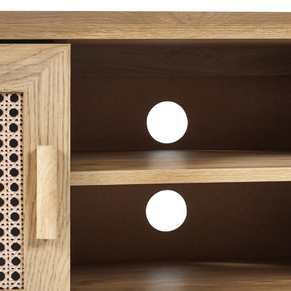 Wooden shelf with round white brackets on a dark background