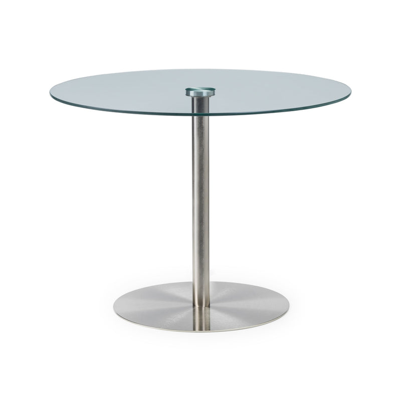 Glass dining table with metal base on a white background