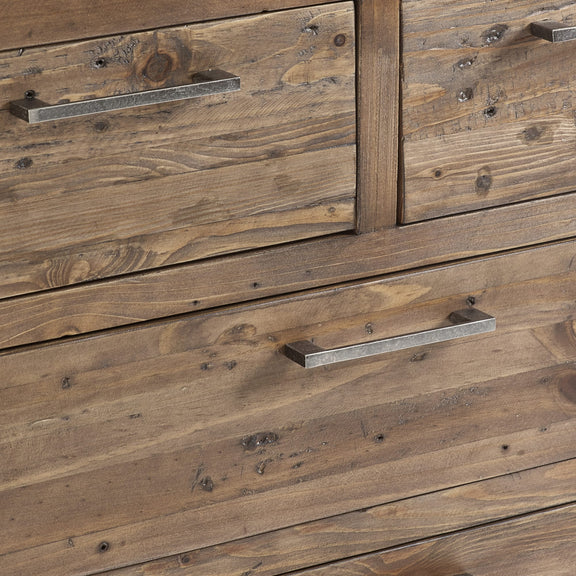 Close-up of a wooden cabinet with metal handles