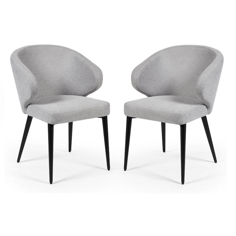 Two gray upholstered chairs with black legs on a white background