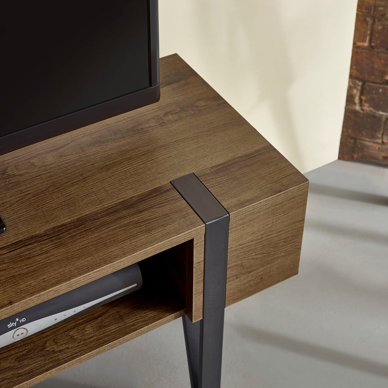 Wooden TV stand with metal leg in a room setting