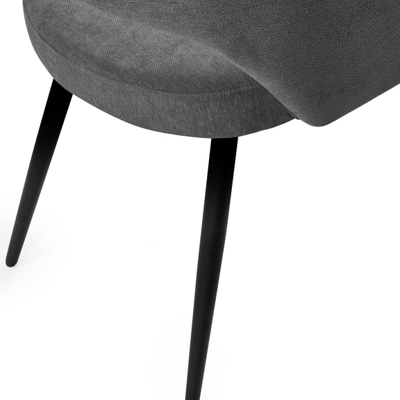 Gray upholstered chair with black legs on a white background