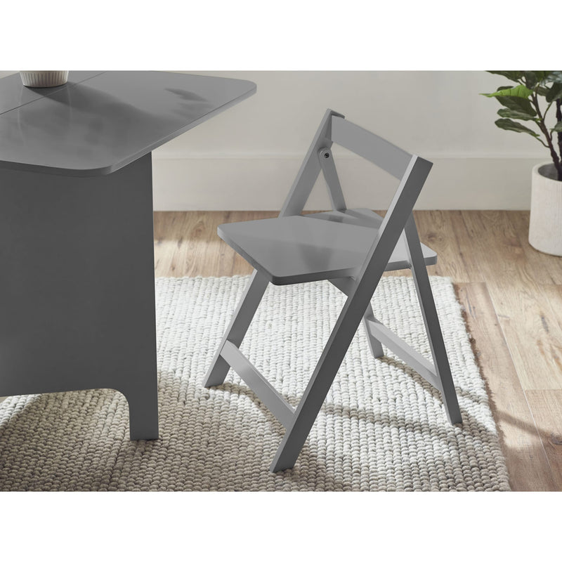 Gray dining table with a matching chair on a wooden floor.