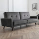 Gray sofa in a room with wooden flooring and a white wall.