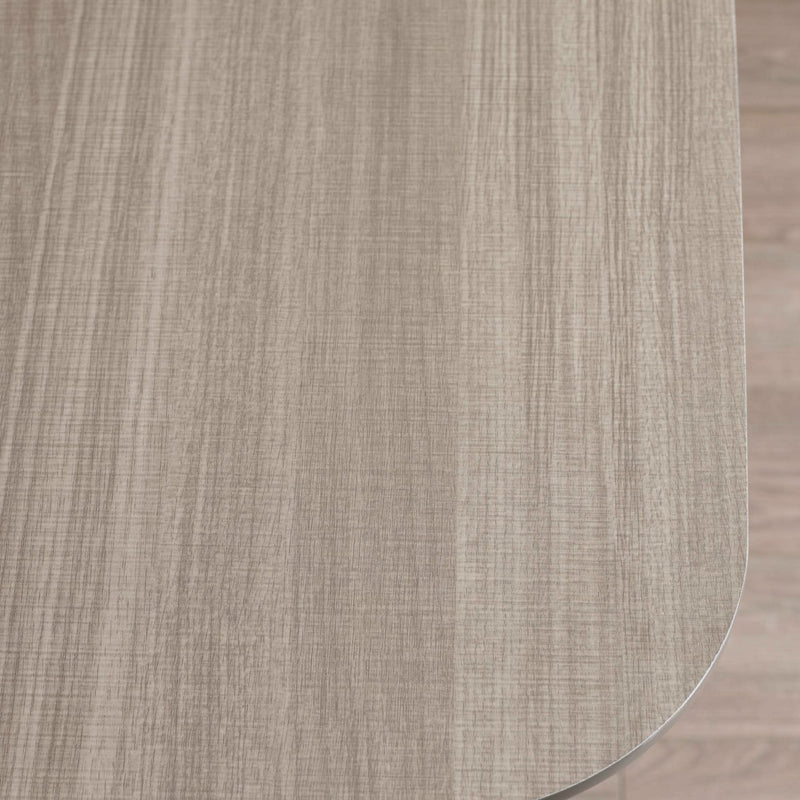 Close-up of a glass table with a wooden finish