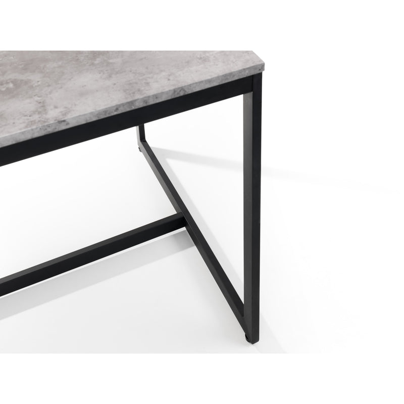 Table with concrete top and black metal legs on a white background