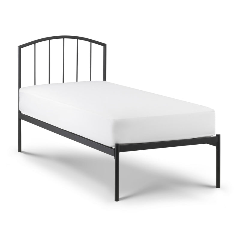Black metal bed frame with white mattress on a white background