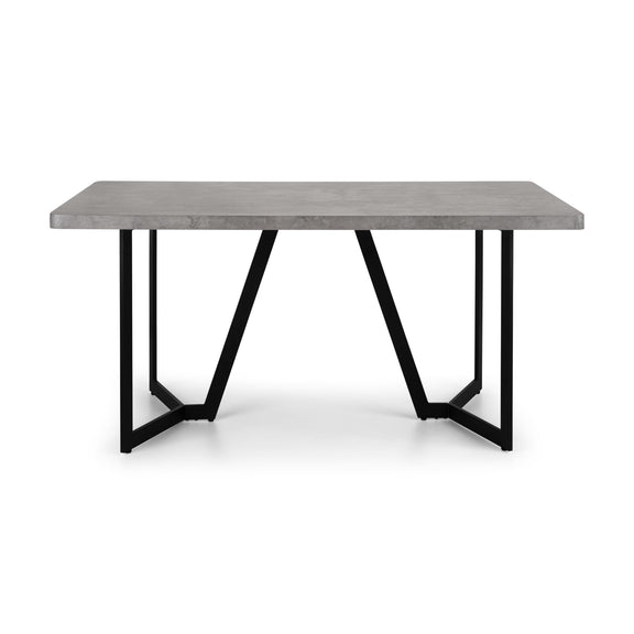 Rectangular table with concrete top and black metal legs on a white background