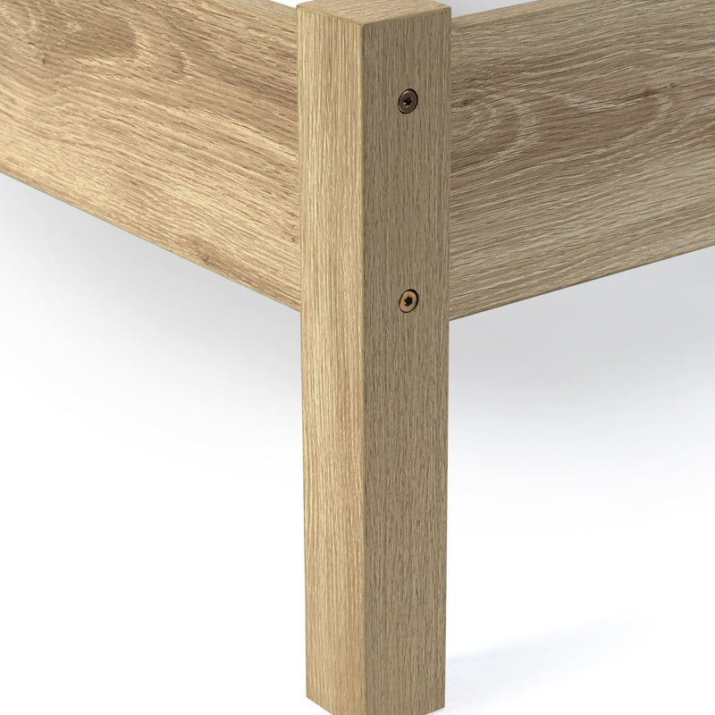 Close-up of a wooden furniture corner with a white background