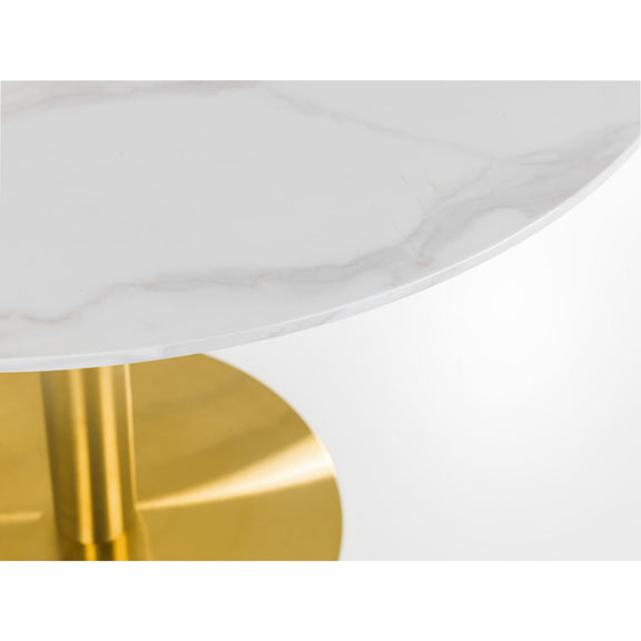 Close-up of a white plate with a gold base on a white background