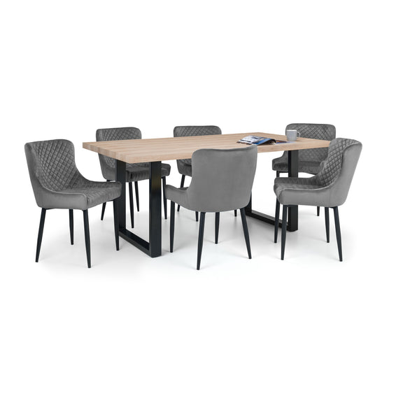 Dining table set with six gray chairs on a white background