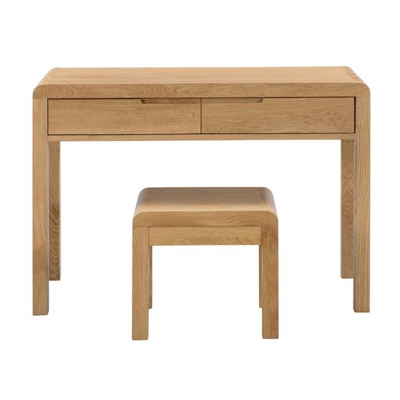Wooden desk with two drawers and a matching stool on a white background