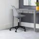 Gray office desk with a chair in a room with a plant and mirror.