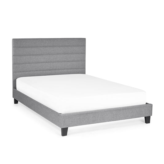 Gray upholstered bed frame with white mattress on a white background