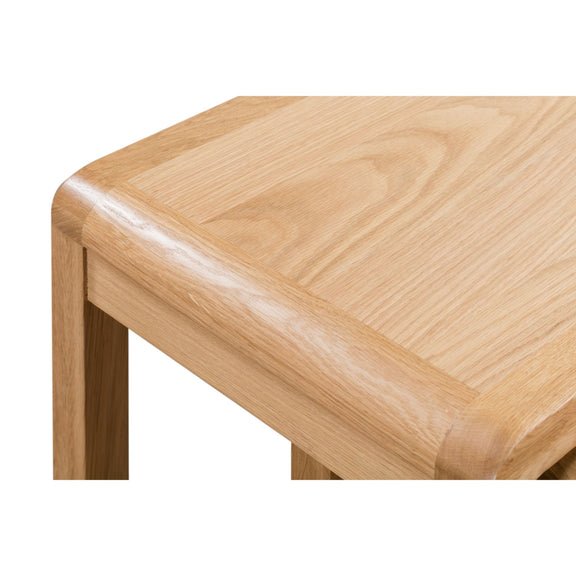 Close-up of a wooden stool with a white background