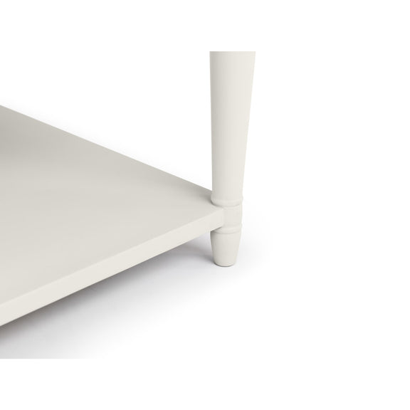White shelf with a single leg on a white background