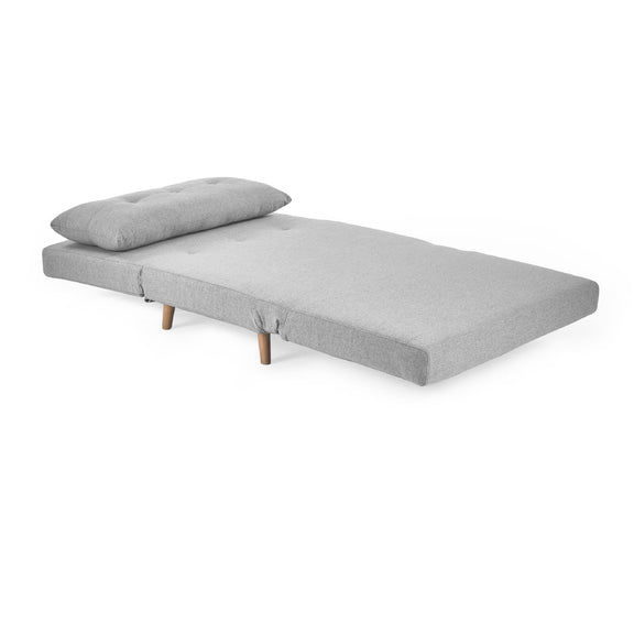 Gray bed with a pillow on a white background