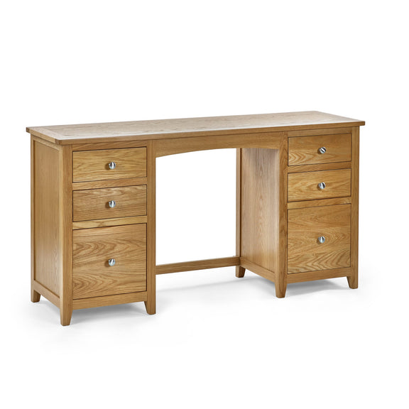 Wooden desk with multiple drawers on a white background