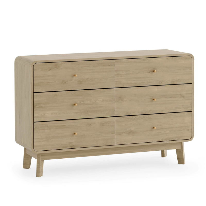 Wooden dresser with four drawers on a white background