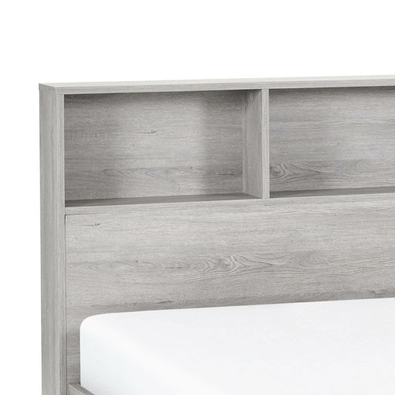 Wooden headboard with bookshelf design on a white background