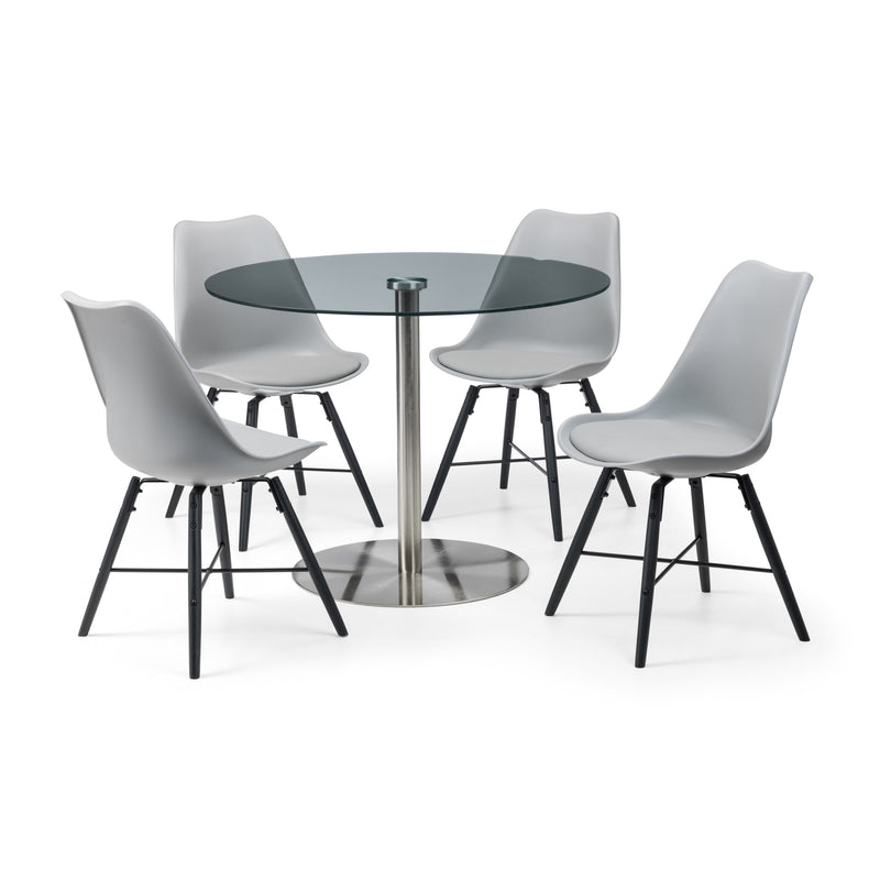 Dining table set with four chairs on a white background
