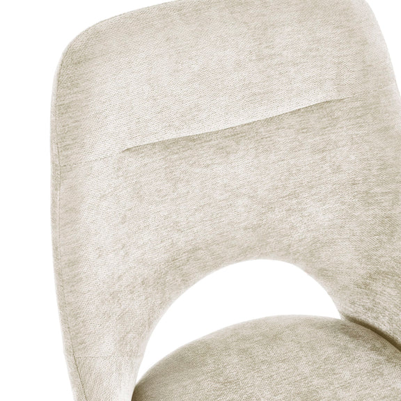 Close-up of a beige upholstered chair with a textured fabric finish on a white background