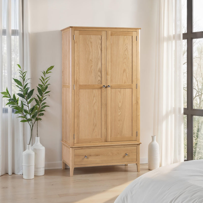 Wooden wardrobe in a bedroom with natural light