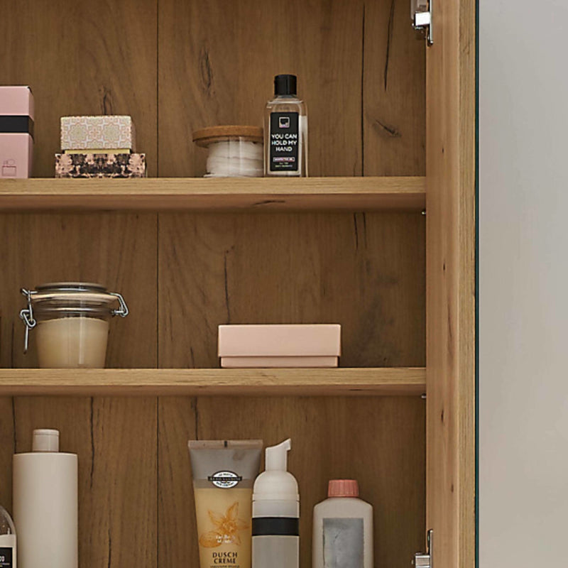 Wooden shelf with various products including bottles and containers.