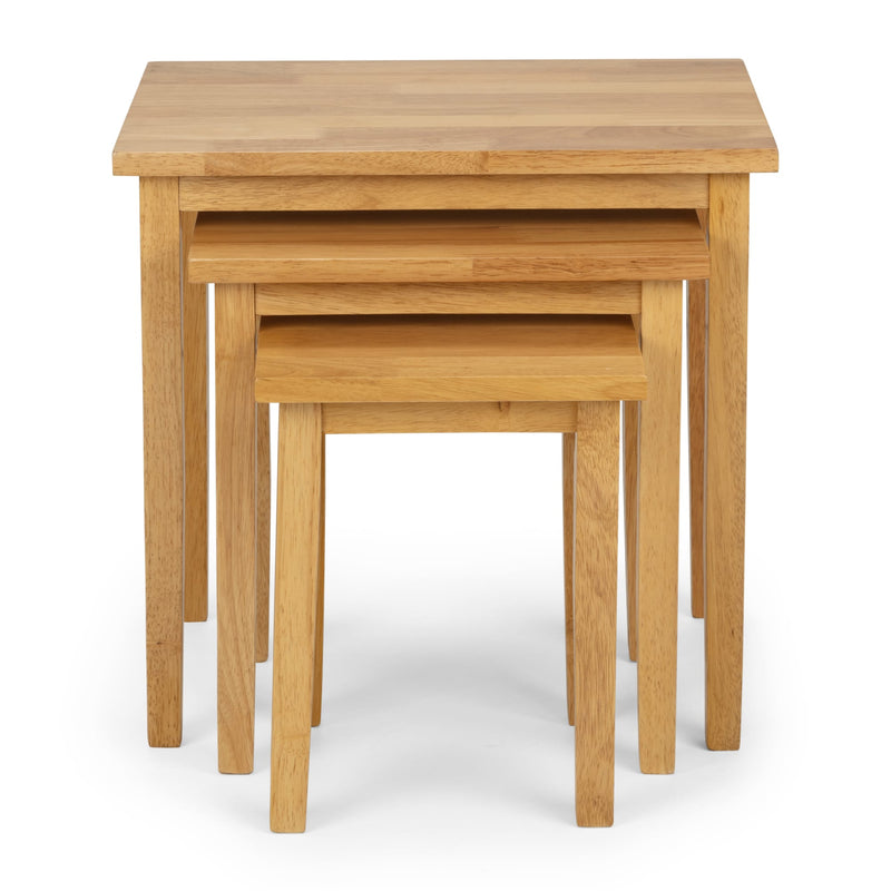 Set of three wooden nesting tables on a white background
