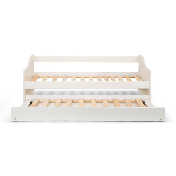 White crib with wooden slats on a white background