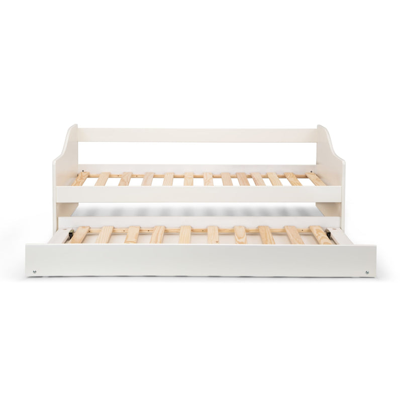 White crib with wooden slats on a white background