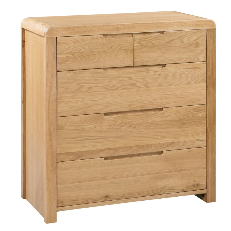 Wooden dresser with four drawers on a white background