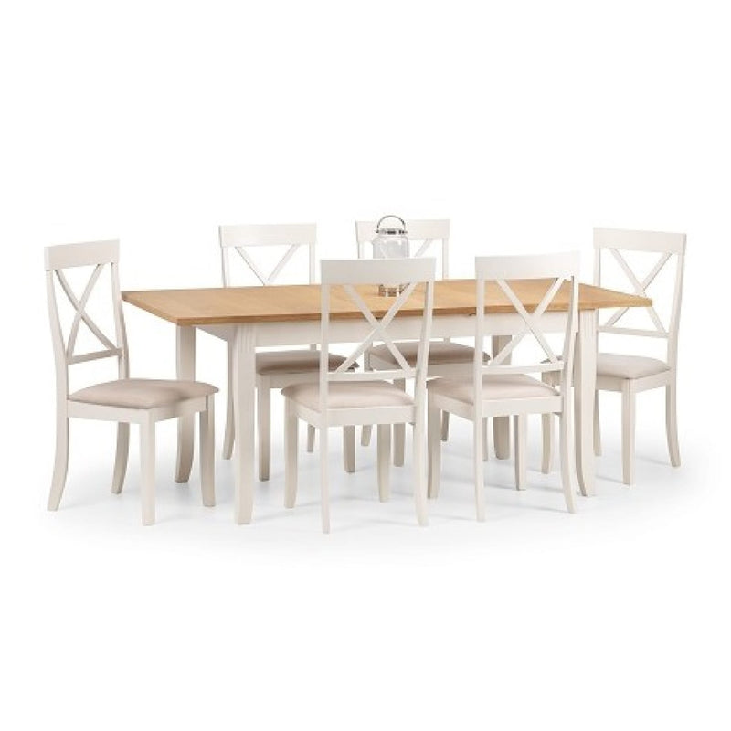 Dining table set with six chairs on a white background