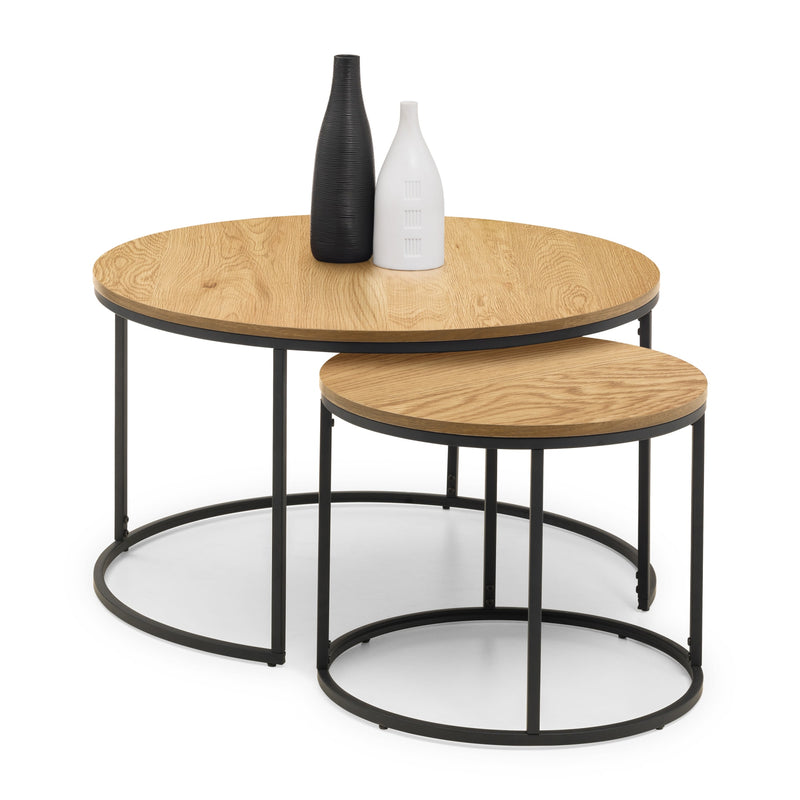 Set of two wooden coffee tables with black metal frames on a white background