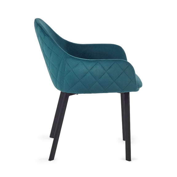 Teal quilted chair with black legs on a white background