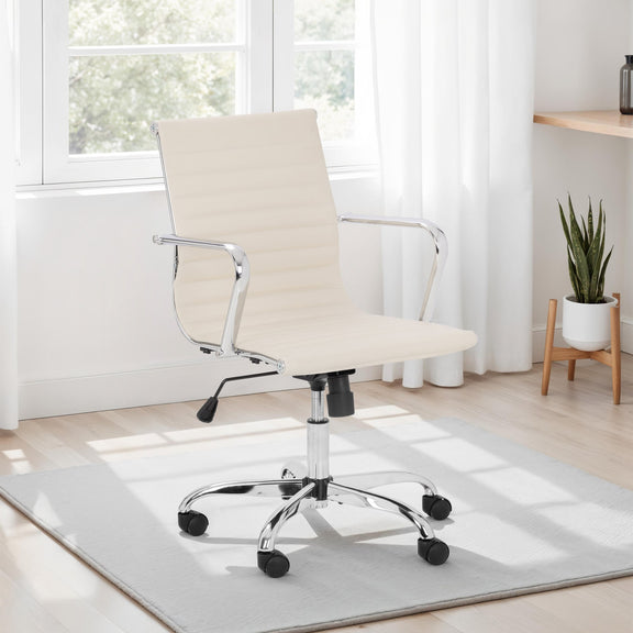 Beige office chair in a bright room with a plant and desk.