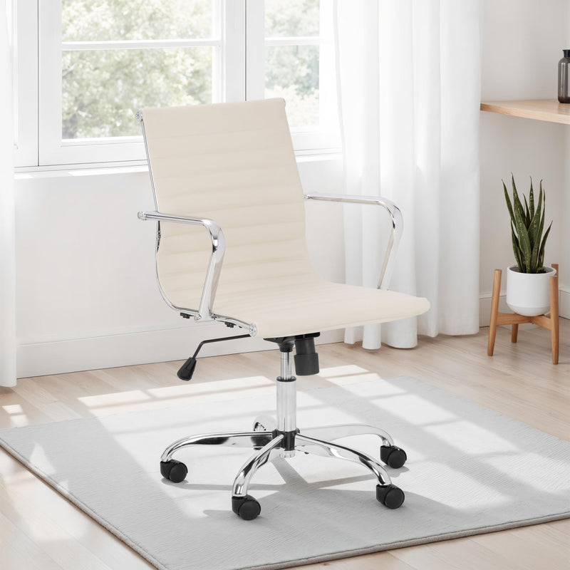 Beige office chair in a bright room with a plant and desk.