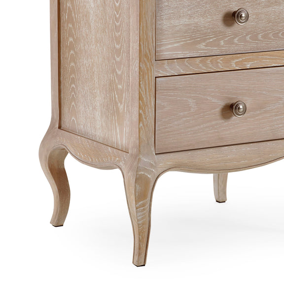 Wooden cabinet with curved legs and two drawers on a white background