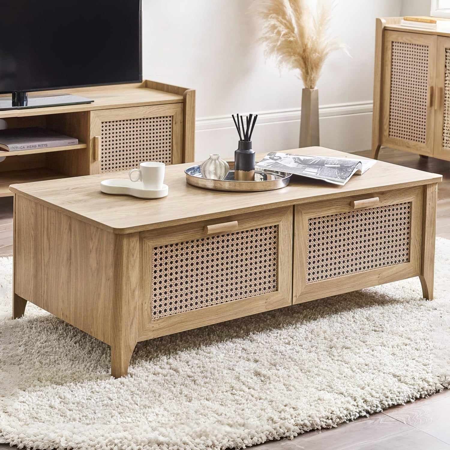 Wooden coffee table with woven design in a living room setting