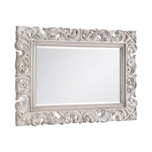 Decorative white mirror with intricate carvings on a white background
