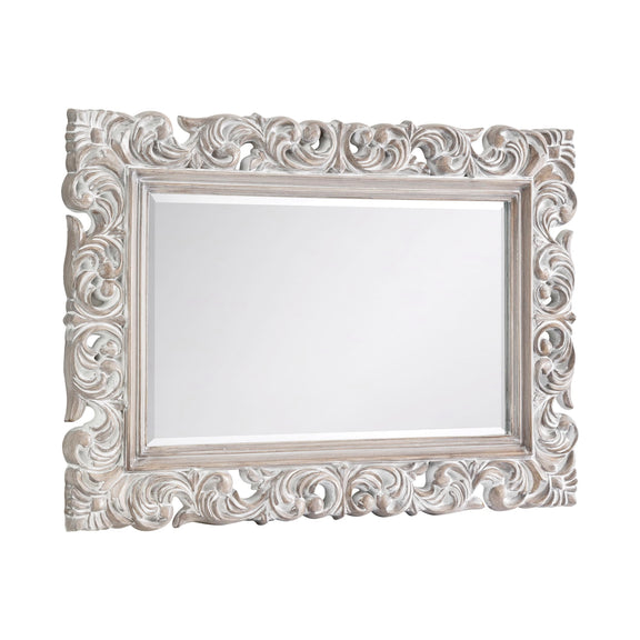 Decorative white mirror with intricate carvings on a white background