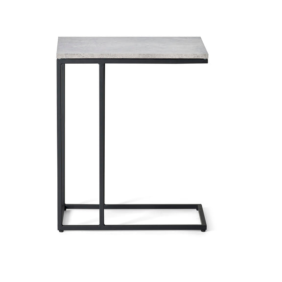 Small side table with marble top and black metal frame on a white background