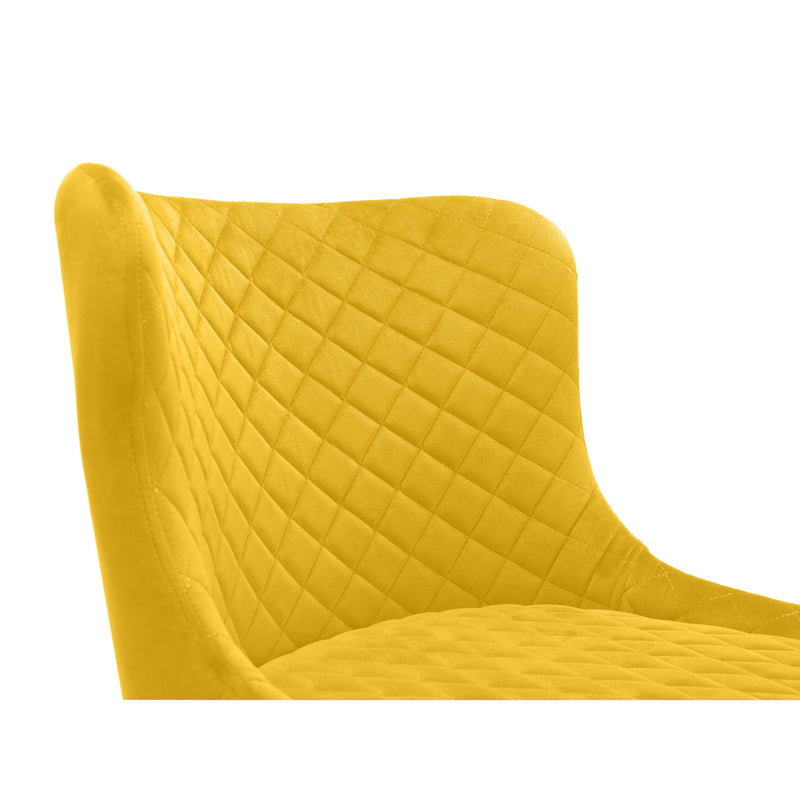 Yellow quilted chair on a white background