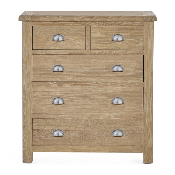 Wooden dresser with five drawers and metal handles on a white background