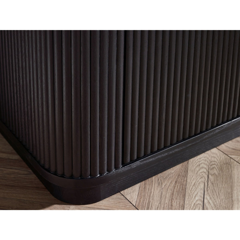 Dark wooden bed frame on a wooden floor