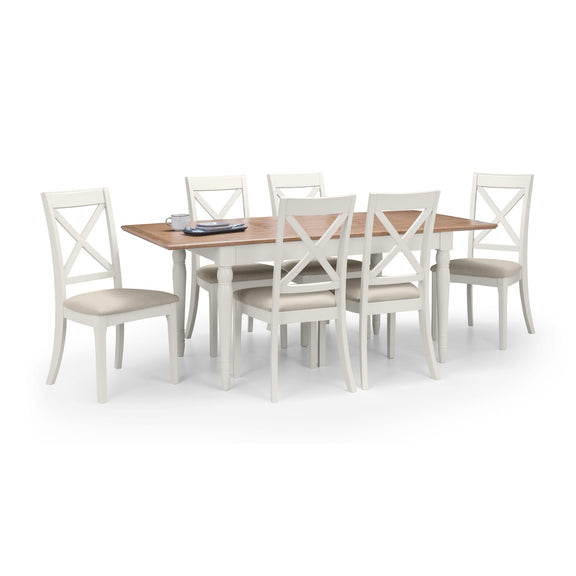 Dining table set with six chairs on a white background