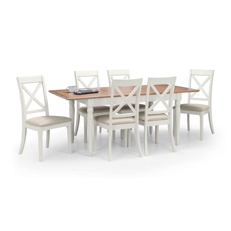 Dining table set with six chairs on a white background