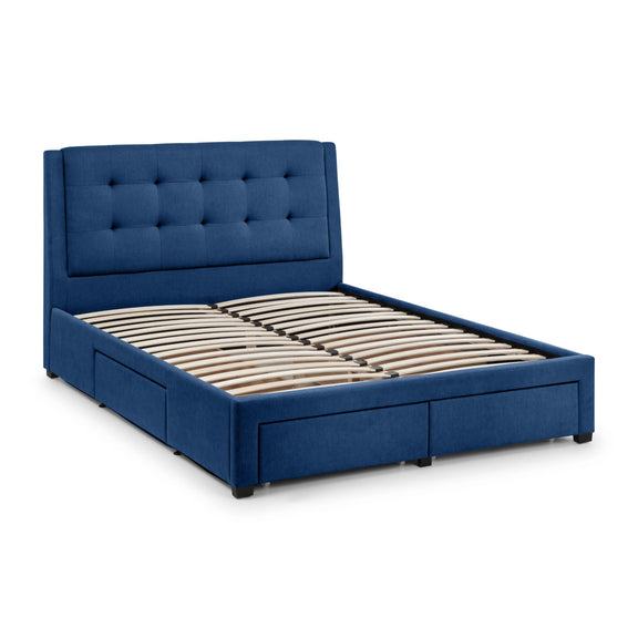 Gray upholstered bed with tufted headboard on a white background