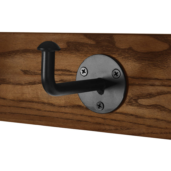 Black metal hook on a wooden surface