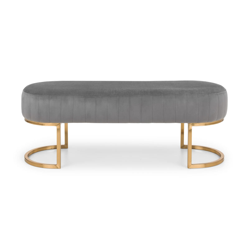 Gray upholstered bench with gold metal legs on a white background
